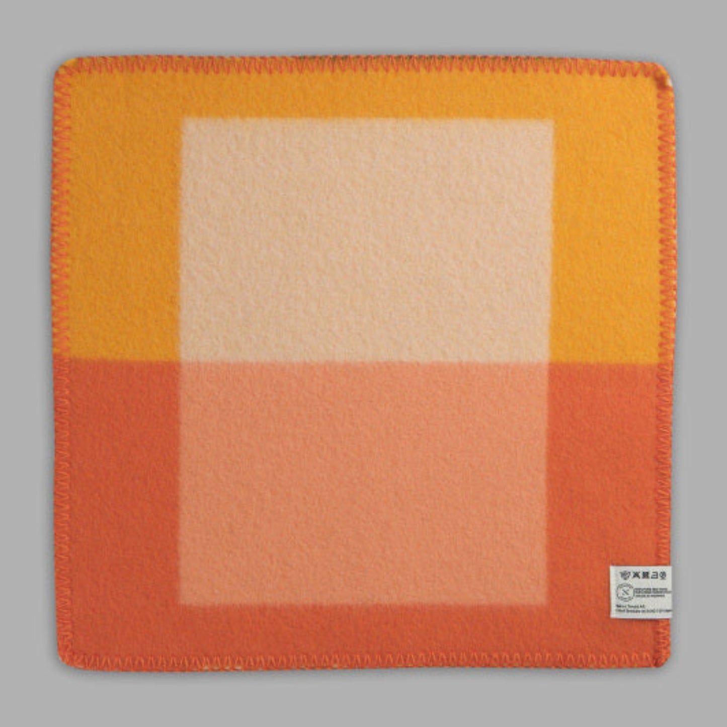 Roros. Wolle - Sitzunterlage SYNDIN CloudberryOrange