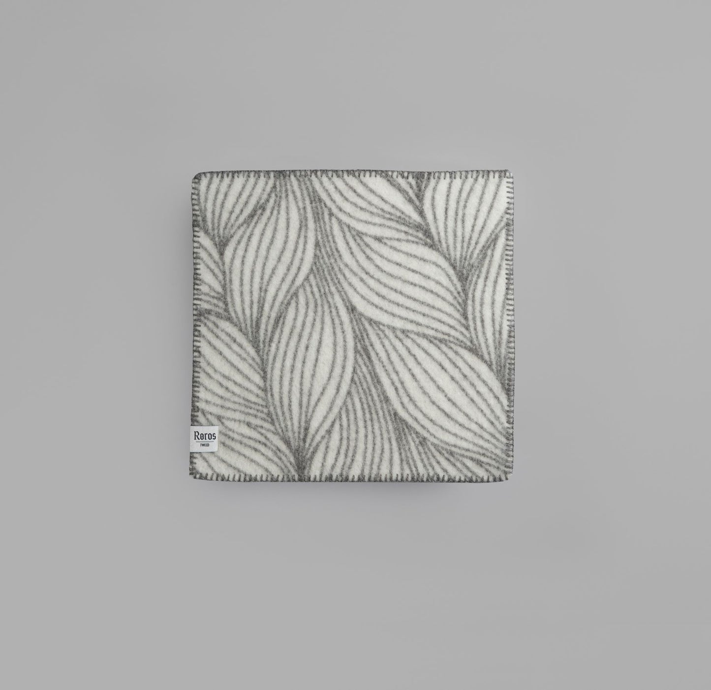 Roros. Wolle - Sitzunterlage Flette Natural/grey Vorderansicht